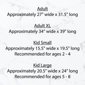 May include: Size chart for a blanket with measurements in inches. Adult size is approximately 27 inches wide by 31.5 inches long. Adult XL size is approximately 34 inches wide by 39 inches long. Kid Small size is approximately 15.5 inches wide by 19.5 inches long and recommended for ages 2-4. Kid Large size is approximately 20.5 inches wide by 24 inches long and recommended for ages 5-8.