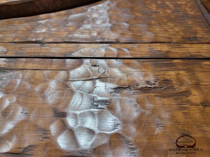 May include: Close-up of a wooden surface with a light brown stain. The wood has a natural, rustic look with knots and grain patterns. The surface is smooth and polished.