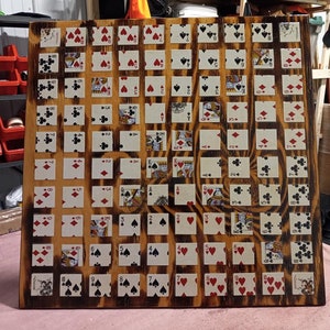 Handmade 24 Inch Square Wood Burned Square Game Board to play the game of sequence. 16 layers of polyurethane and lacquer.