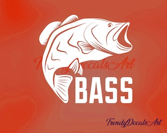 May include: White graphic of a bass fish with an open mouth, jumping upwards, set against a red background. The word "BASS" is in bold white letters below the fish. The text "TrendyDecalsArt" is in the bottom right corner.