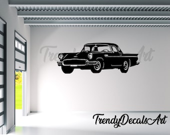 May include: A black silhouette of a classic car, possibly a Ford Thunderbird, against a white wall. The car is shown in profile, highlighting its vintage design. The text "Trendy Decals Art" is displayed at the bottom.