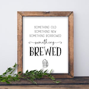 Pode incluir: Uma placa enquadrada com o texto "Something old, something new, something borrowed, something brewed" e uma ilustração de uma caneca de cerveja.