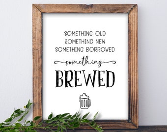 May include: A framed sign with the text "Something old, something new, something borrowed, something brewed" and a beer mug illustration.
