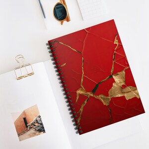 May include: Red and gold abstract art print with a cracked and textured surface. The gold is in the cracks of the red surface.