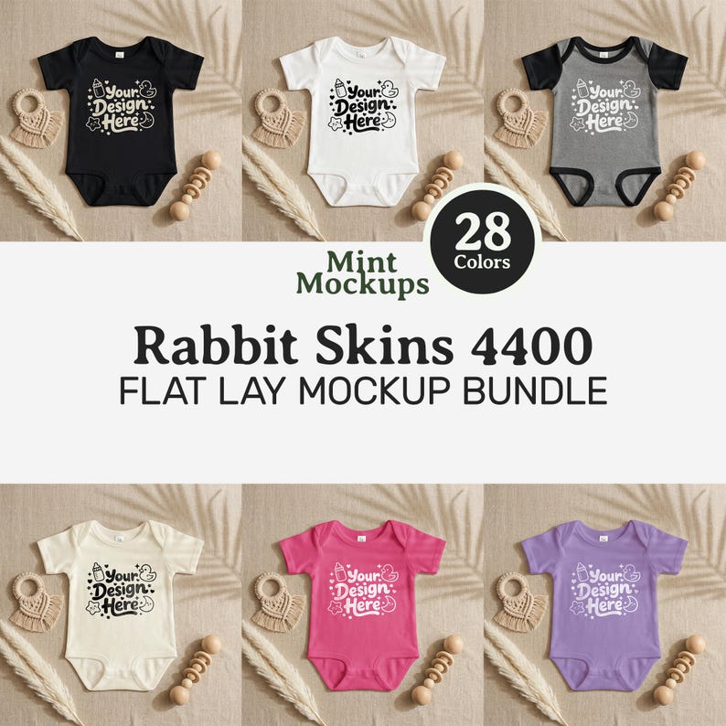 May include: A flat lay mockup bundle featuring baby onesies in various colors, including black, white, gray, cream, pink, and purple. Each onesie has the text "Your Design Here." Accompanying the onesies are wooden baby toys and dried plants. The text "Rabbit Skins 4400 FLAT LAY MOCKUP BUNDLE" is also visible.