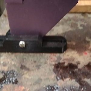 AtomStack A5 and A5 pro and probably more leg brackets clamp down or screw