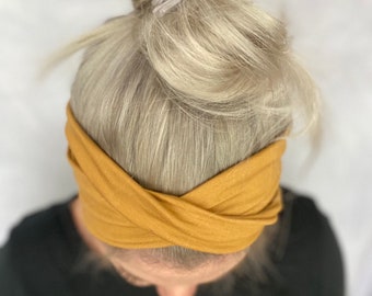 Bandeau noué Nouélina jaune moutarde avec noeuds ou peut se porter en look turban, large ou étroit et élastique