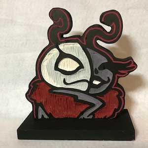 Divine woodcut sculpture