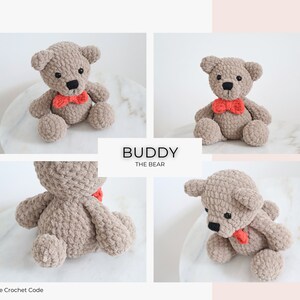 May include: A crocheted teddy bear named Buddy, wearing a red bow tie. The bear is sitting on a white surface. The bear is made of a soft, fuzzy material. The bear is a light brown color. The bear is a handmade crochet toy.