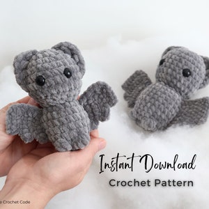 May include: A crochet pattern for a gray bat amigurumi toy. The pattern is available for instant download. The image shows two finished bats, one being held in a person's hands.