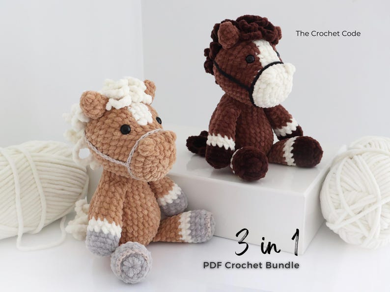 Two handmade crochet horse plushies in shades of brown, tan, and white. One horse is sitting on a white surface, and the other is beside it. The text "The Crochet Code" and "3 in 1 PDF Crochet Bundle" are also visible.