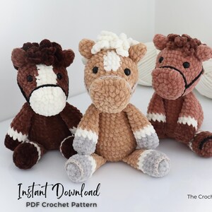 Three plush crochet horse toys in shades of brown, tan, and white sit side-by-side. Each horse has a unique color pattern and black eyes. The text "Instant Download PDF Crochet Pattern" is visible at the bottom. The Crochet Code is also visible.