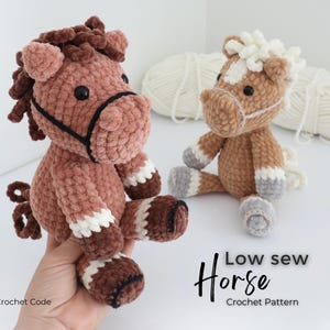 Two handmade crochet horse plushies in shades of brown, white, and gray. One is held by a hand. The text "Low sew Horse Crochet Pattern" is visible. The horses have black eyes and are made of soft yarn.