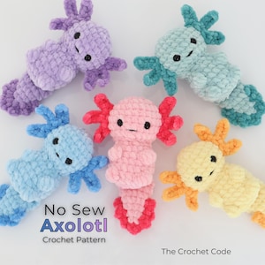 May include: Five plush axolotl toys crocheted in purple, light blue, teal, pink, and yellow with orange accents. Each has black eyes and a small mouth. Text reads: No Sew Axolotl Crochet Pattern and The Crochet Code.