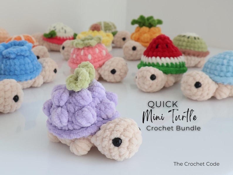 May include: A collection of handmade crochet turtles with various fruit-themed shells, including watermelon, strawberry, and pineapple. The turtles are in shades of beige, pink, green, and blue, with black eyes. The text "Quick Mini Turtle Crochet Bundle" is visible.