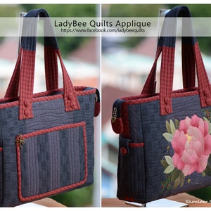 May include: A quilted shoulder bag with a red and black gingham handle and a large floral applique on the front. The bag has a zipper closure and a small pocket on the front. The text "Shoulder Bag @2020" is printed on the bottom right corner of the bag.