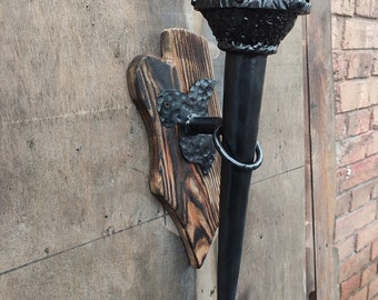 Steel torch. Decorative torch.Wall lighting. Sconce. Medieval lamp. Wrought iron lamp.