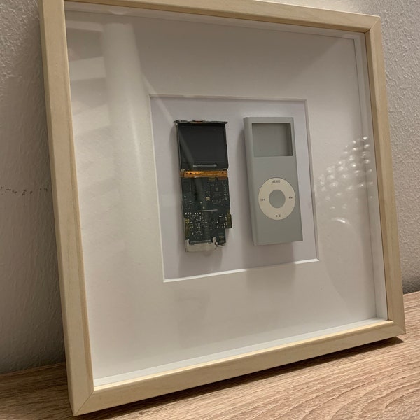 iPod Nano 2 Gen  (logic board + case) in a frame