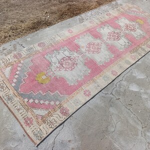 May include: A white ceramic mug with a black handle and the text "But First, Coffee" in a bold, black font. The mug is likely 11-15 ounces in size, perfect for a morning beverage. The design is simple and modern.