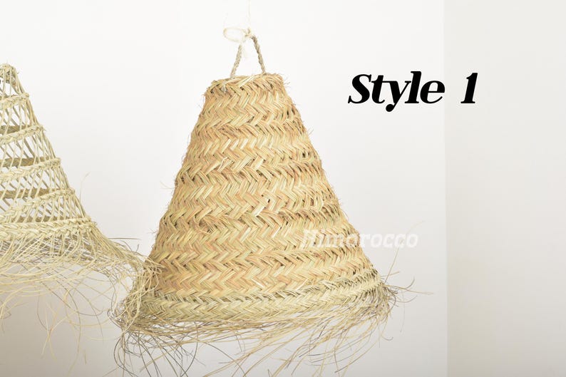 May include: A natural woven lampshade with a fringe, in a cone shape. The lampshade is made of natural materials and has a light brown color. The text "Style 1" is visible in the image.