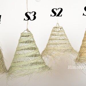 May include: Four different styles of woven lampshades, labeled S1, S2, S3, and S4. The shades are made of natural materials and have a rustic, bohemian aesthetic.