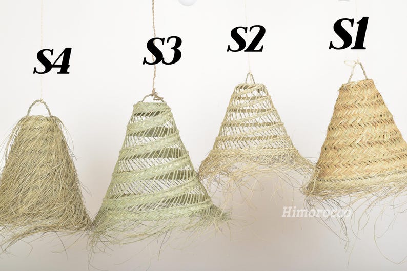 May include: Four different styles of woven lampshades, labeled S1, S2, S3, and S4. The shades are made of natural materials and have a rustic, bohemian aesthetic.