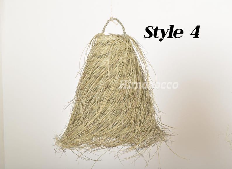 May include: A natural fiber lampshade in a light beige color, hanging from a white ceiling. The lampshade is made of long, thin strands of material, giving it a wispy, airy appearance. The text "Style 4" is visible in the upper right corner of the image.