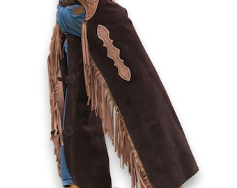 May include: A brown suede chaps with fringe and leather accents. The chaps have a floral design on the front and a decorative strap with a buckle.