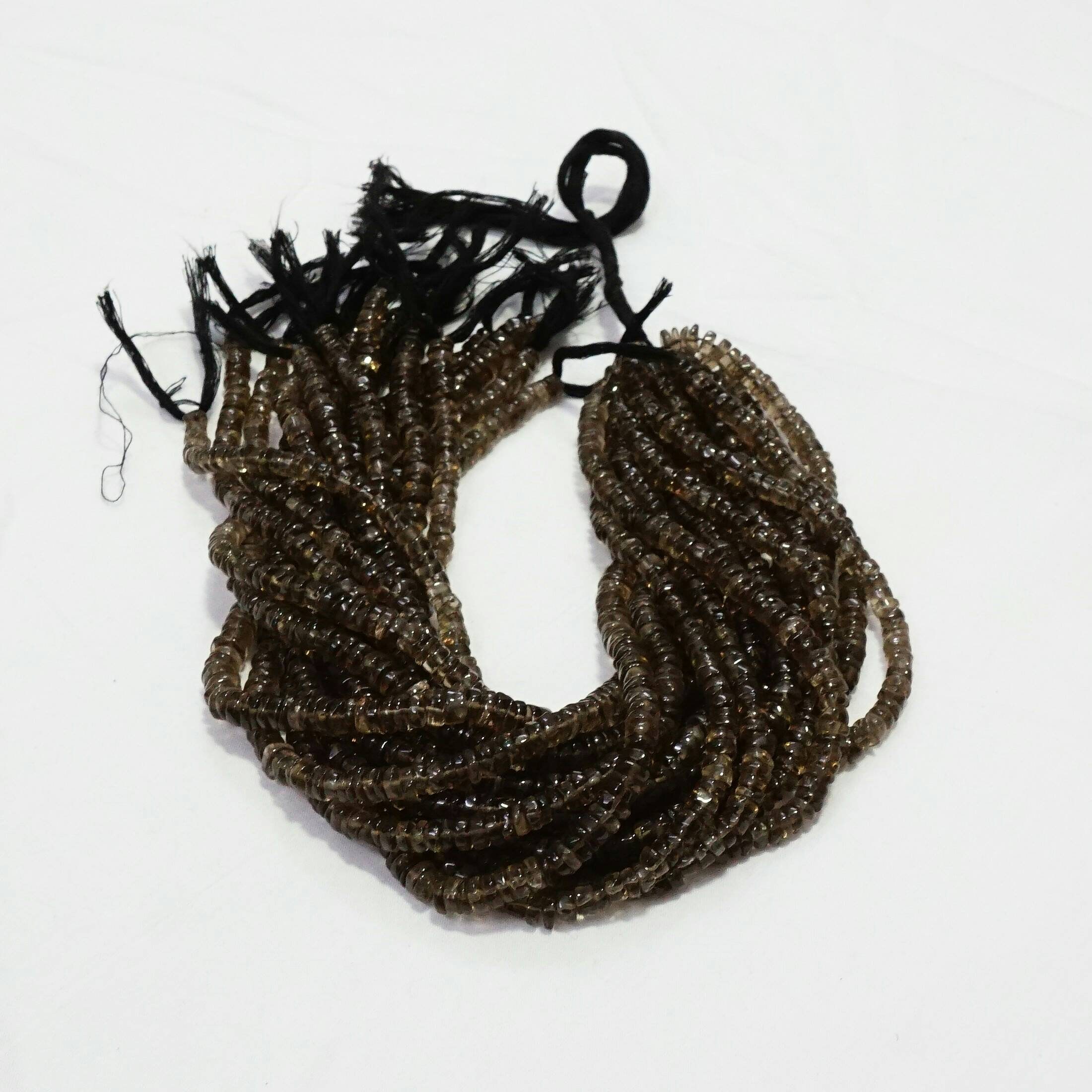 Smoky topaz Plain tyre beads Smoky topaz Plain tyre beads