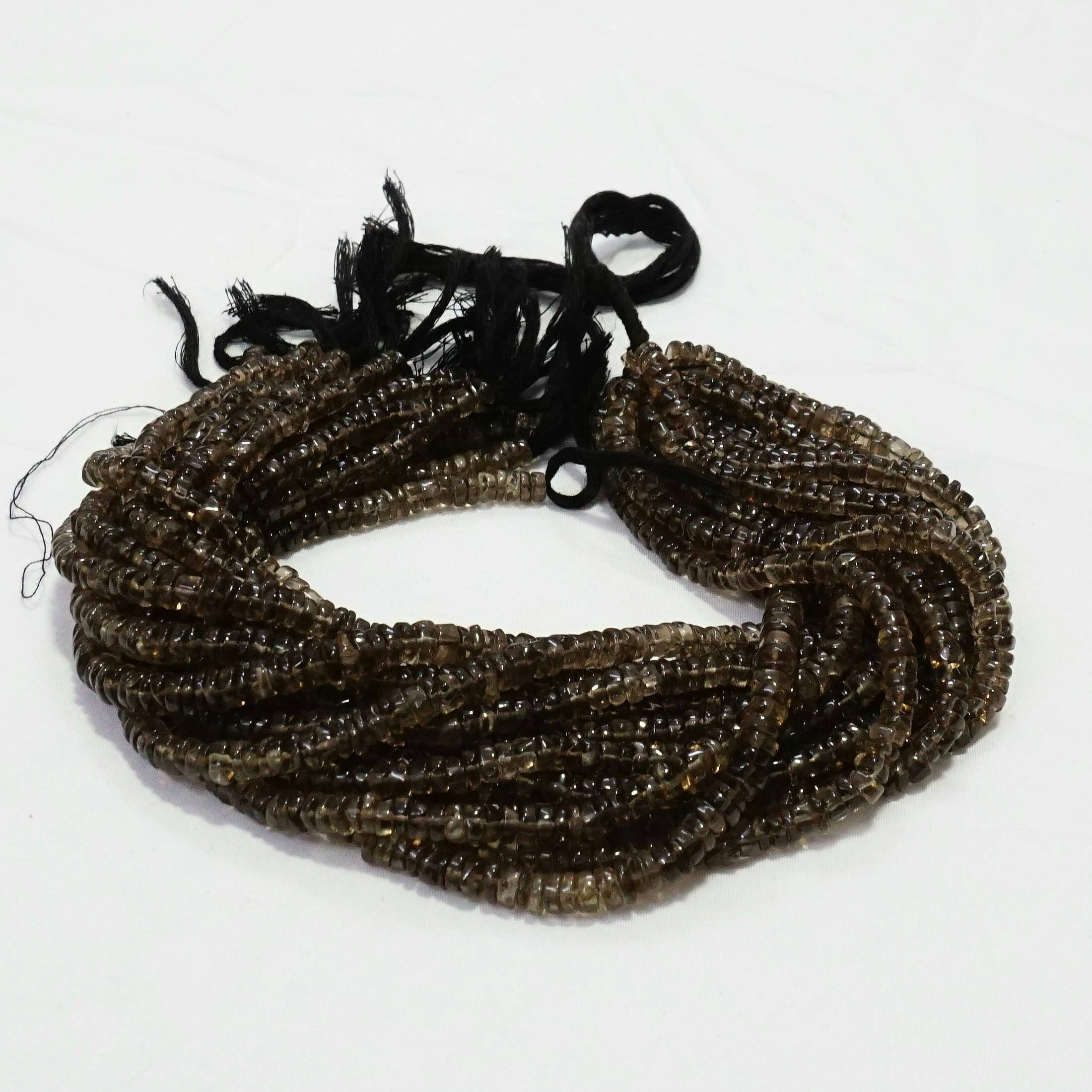 Smoky topaz Plain tyre beads Smoky topaz Plain tyre beads
