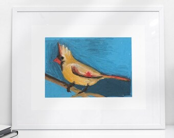 May include: A framed painting of a yellow cardinal perched on a branch against a blue background.