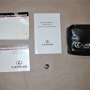 Lexus RX300 OEM Owner Manual Key Chain First Aid Kit