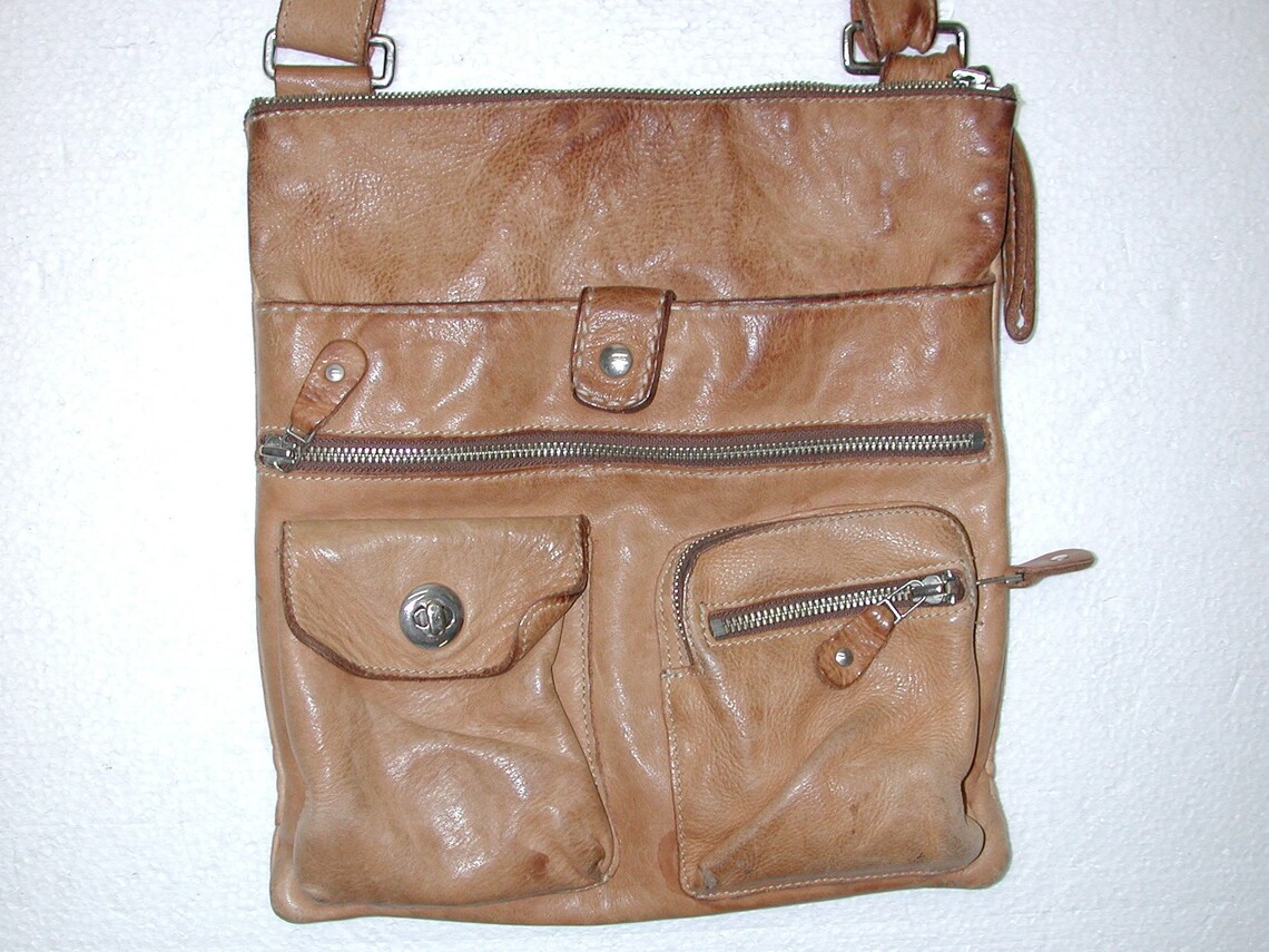 roots leather travel bag