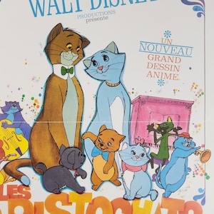 May include: A vintage movie poster for the animated film "The Aristocats" from Walt Disney Productions. The poster features a colorful illustration of the main characters, including a brown cat, a blue cat, and a group of kittens. The text on the poster reads "Walt Disney Productions presents a new animated film, The Aristocats. An explosion of joy, rhythm, and humor. Technicolor."