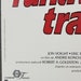 May include: A movie poster for the film "Runaway Train" starring Jon Voight and Eric Roberts. The poster is white with red and black text. The text reads "Runaway Train", "Jon Voight", "Eric Roberts", "A film by Andrei Konchalovsky", "Producer Robert A. Goldston", and "Based on a screenplay by..."