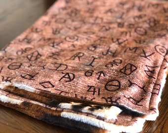 The Cattle Brands on Wood Blanket
