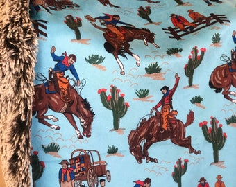 Cowboy Bronc Bustin’ Blanket in Blue