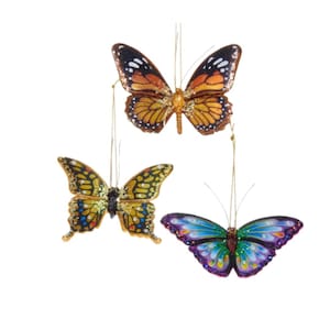 Może przedstawiać: Trzy ozdobne ozdoby w kształcie motyla z błyszczącymi akcentami. Motyle są pomarańczowe i czarne, żółte i czarne oraz fioletowe i niebieskie.