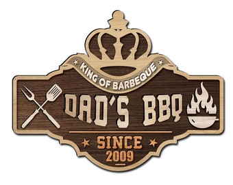 May include: A wooden sign with a crown, flames, and the text "King of Barbeque", "Dad's BBQ", and "Since 2009".
