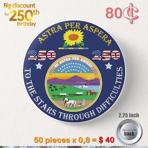 May include: A round, blue button with the text "ASTRA PER ASPERA" and a sunflower design. The button has the text "TO THE STARS THROUGH DIFFICULTIES" and "250" on it. The button is 2.25 inches in diameter.