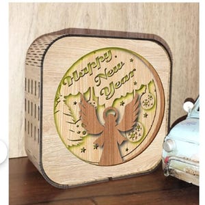 New year night light laser cut file. angel, new year themed laser cut file night light. wooden laser cut night light files. laser cut file.