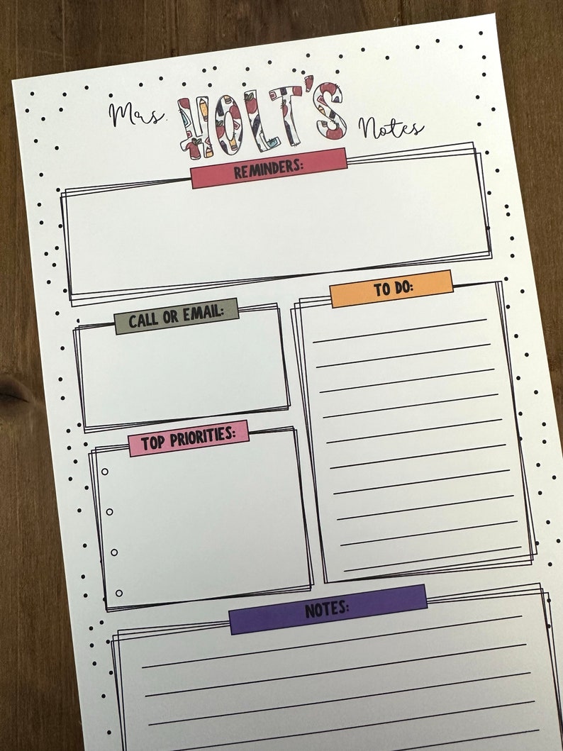 May include: A printable planner page with the title "Mas Holt's Notes". The page is divided into sections for reminders, to do, top priorities, and notes. Each section has a coloured title bar.