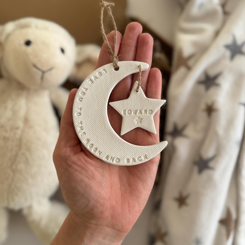 May include: A set of three ceramic mugs with a speckled, matte finish. The mugs are in shades of cream, light gray, and dark gray. Each mug has a simple, minimalist design, perfect for coffee or tea.