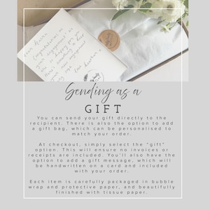 May include: A rustic wooden sign with the text "Welcome to our home" in white lettering. The sign features a distressed finish and a simple, inviting design, perfect for front door decor.