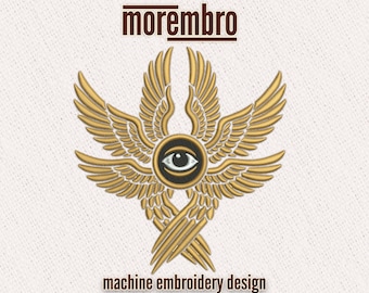 May include: Machine embroidery design featuring a stylized eye with wings. The design is in gold and black and says "morembro" at the top.