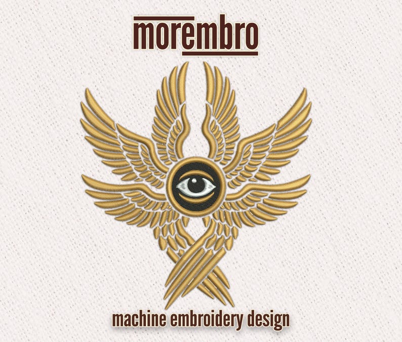 May include: Machine embroidery design featuring a stylized eye with wings. The design is in gold and black and says "morembro" at the top.