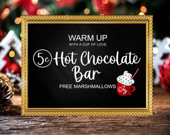 May include: A gold framed chalkboard sign with the text "Warm Up with a cup of love 5c Hot Chocolate Bar Free Marshmallows" and a red and white illustration of a mug of hot chocolate with whipped cream and sprinkles.