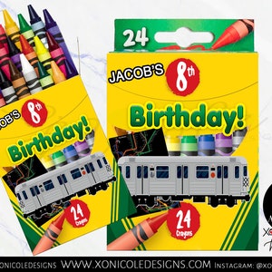 May include: A yellow and green box with a subway train design. The box says "Jacob's 8th Birthday!" and has 24 crayons inside. The box is decorated with a subway map and a red crayon.