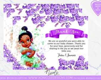 May include: Baby shower thank you cards featuring a cartoon illustration of a baby girl in a green dress, holding a bottle. The cards have a lavender floral design and the text "Thank You". The card also includes the names "Tara & James".
