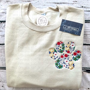 Floral paw print jewel tone embroidered tan crewneck sweatshirt